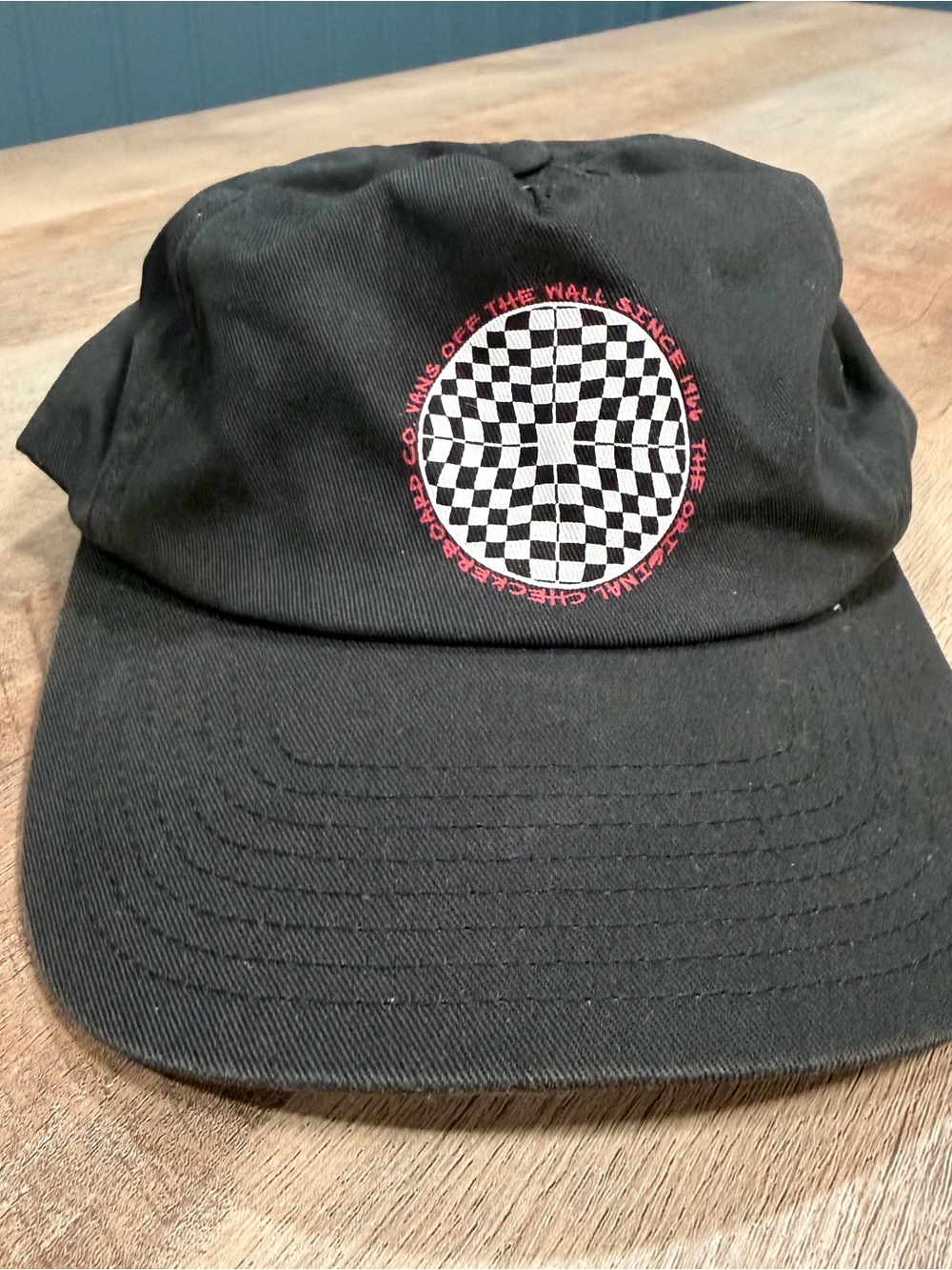 Vans Black Dad Hat with White Checkerboard Circle and Red Trim